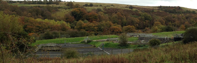 Brynmawr sewage works, rebuilt following the rock fall. The grass behind the filter beds marks the edge of the gorge, with the A465 immediately below. Click to enlarge