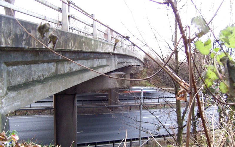 Brindle Road Bridge is the same unappealing colour as all concrete that's spent 60 years outdoors in northern England, but its unassuming appearance hides its interesting place in history.
