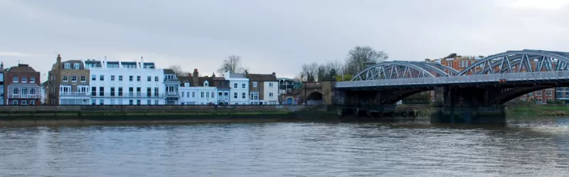 The serene riverfront at Barnes Bridge. Ringway 2 would have crossed the river in front of the railway bridge and destroyed half the historic terrace. Click to enlarge