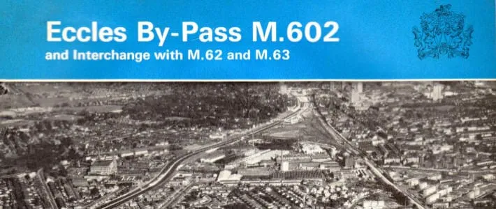 Aerial photograph of a motorway under construction through an urban area, with the title "Eccles By-Pass M.602" above it