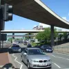 Looking north along Byrom Street, the two flyovers seen in succession - the south flyover near the camera and the north flyover in the distance.