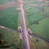 View west from Leeds-Liverpool Canal underbridge to Sandy Lane