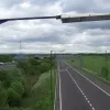 At the point the bridge crosses Worsley Braided Interchange, there are just four parallel carriageways, but it offers a good view west to the point where they split into eight separate roadways. The southernmost carriageway is this one, which comes from Salford and the A580.